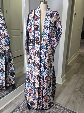 Women's reversible patterned long chapan jacket.